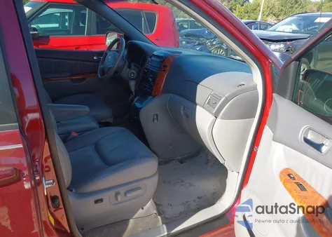 2009 Toyota Sienna Xle z USA, uszkodzony, nr VIN 5TDZK22C59S268329